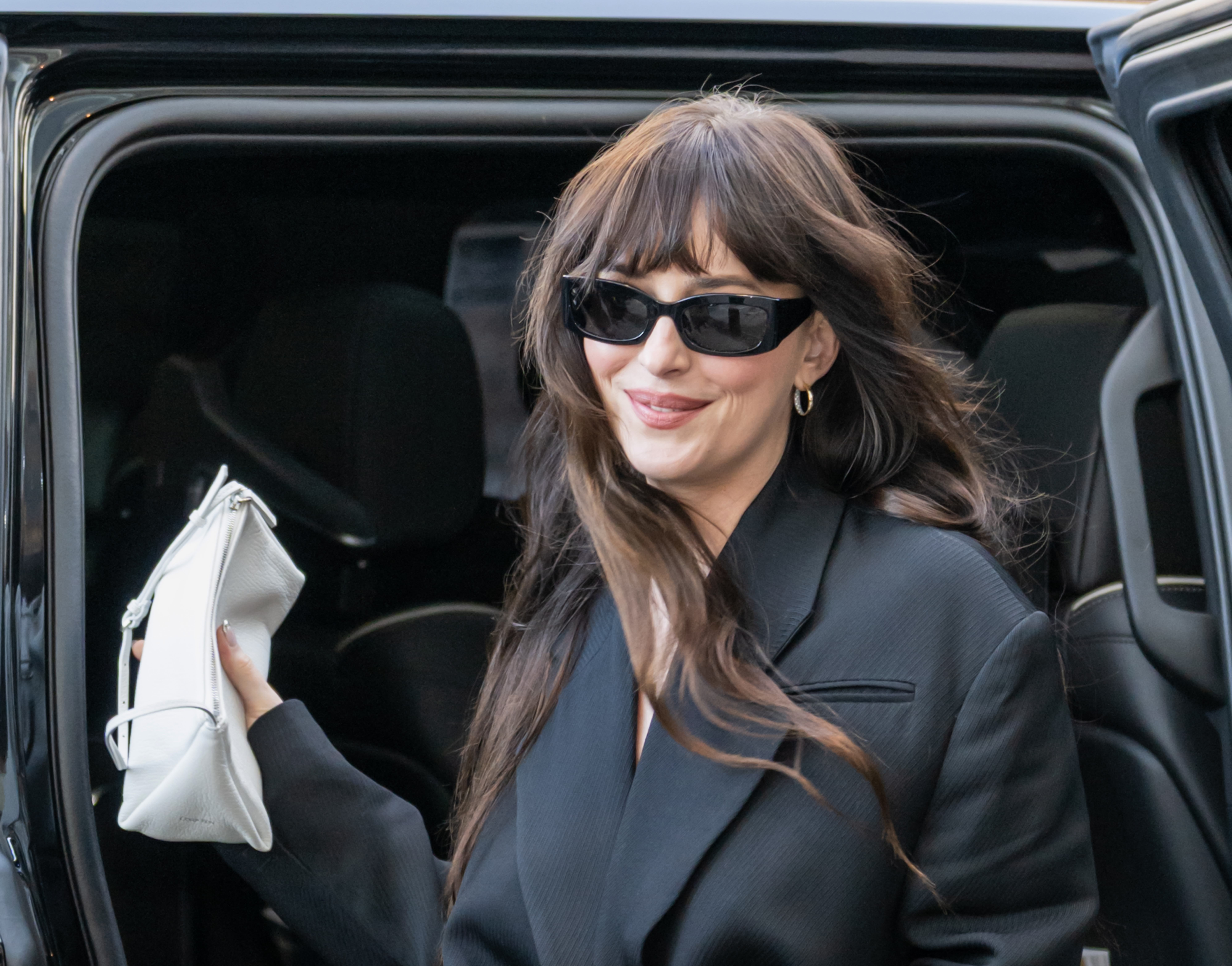 Celeb Dakota Johnson's Spring Vibe: $18 White Bag Steals the Show!